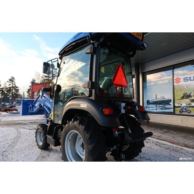 Solis 26 HST hytillä 4wd sininen pientraktori etukuormaajalla ja sorakauhalla