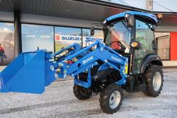 Solis 26 HST ohjaamolla 4wd sininen pientraktori etukuormaajalla ja sorakauhalla sek&auml; moottoril&auml;mmittimell&auml;