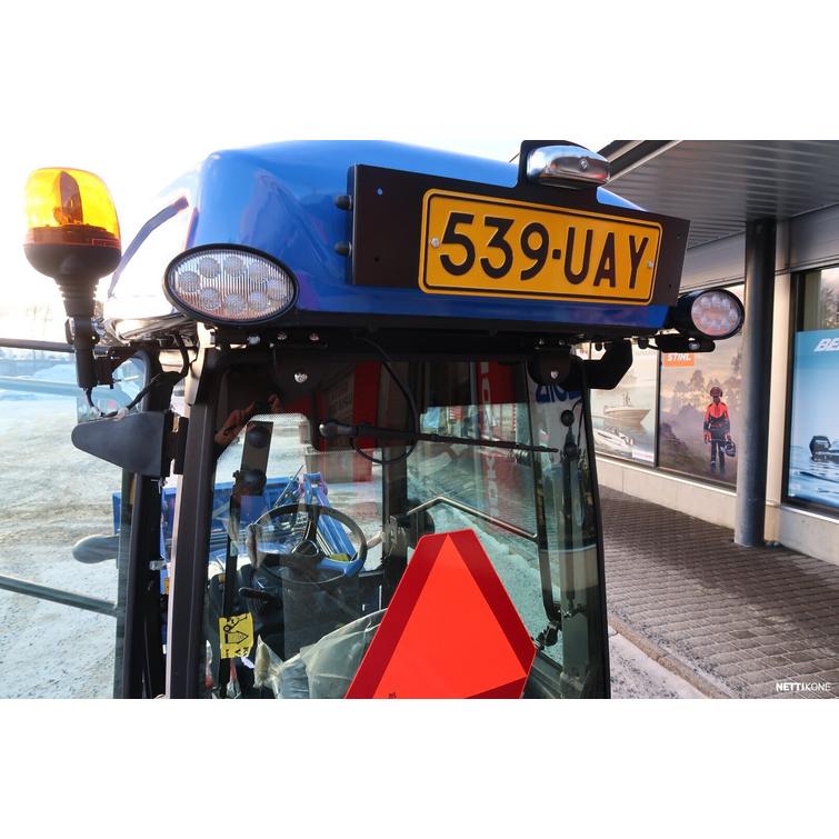 Solis 26 HST hytillä 4wd sininen pientraktori etukuormaajalla ja sorakauhalla