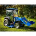 Solis 26 HST ohjaamolla 4wd sininen pientraktori etukuormaajalla ja sorakauhalla sekä moottorilämmittimellä