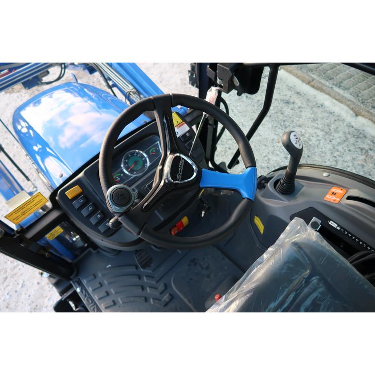 Solis 26 HST ohjaamolla 4wd sininen pientraktori etukuormaajalla ja sorakauhalla sekä moottorilämmittimellä