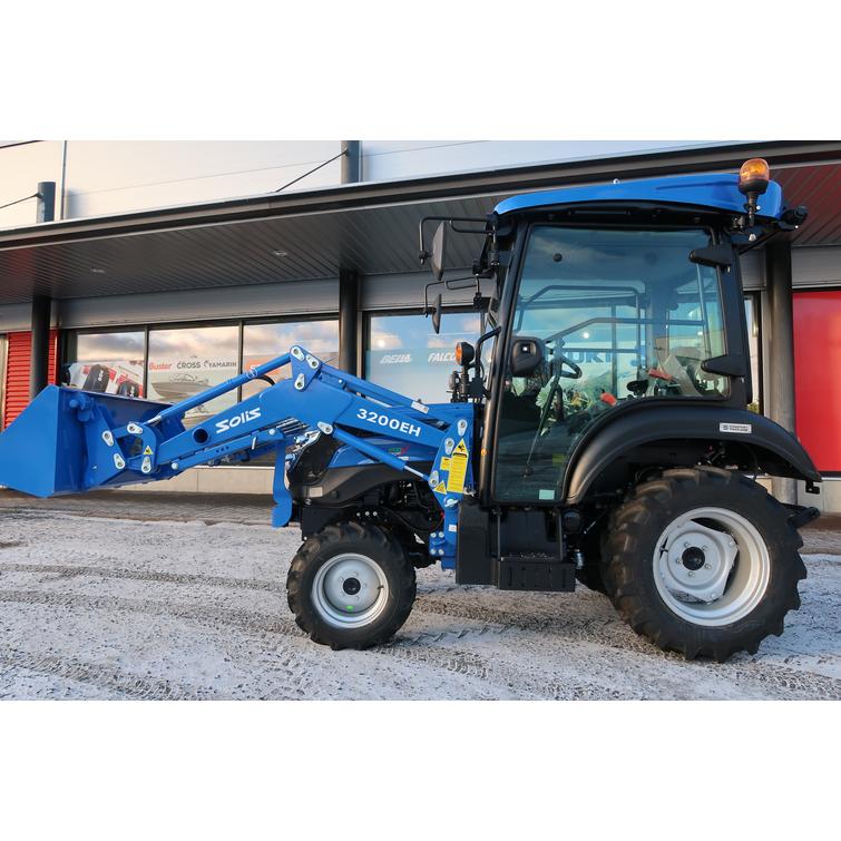 Solis 26 HST ohjaamolla 4wd sininen pientraktori etukuormaajalla ja sorakauhalla sekä moottorilämmittimellä